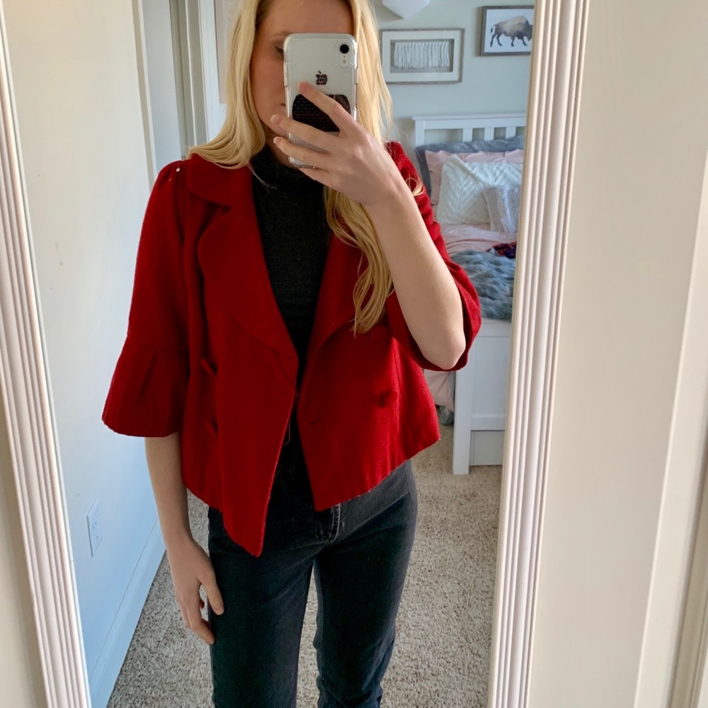 Quarter length bell sleeved coat